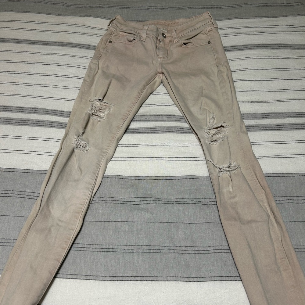 Distressed Beige Skinny Jeans